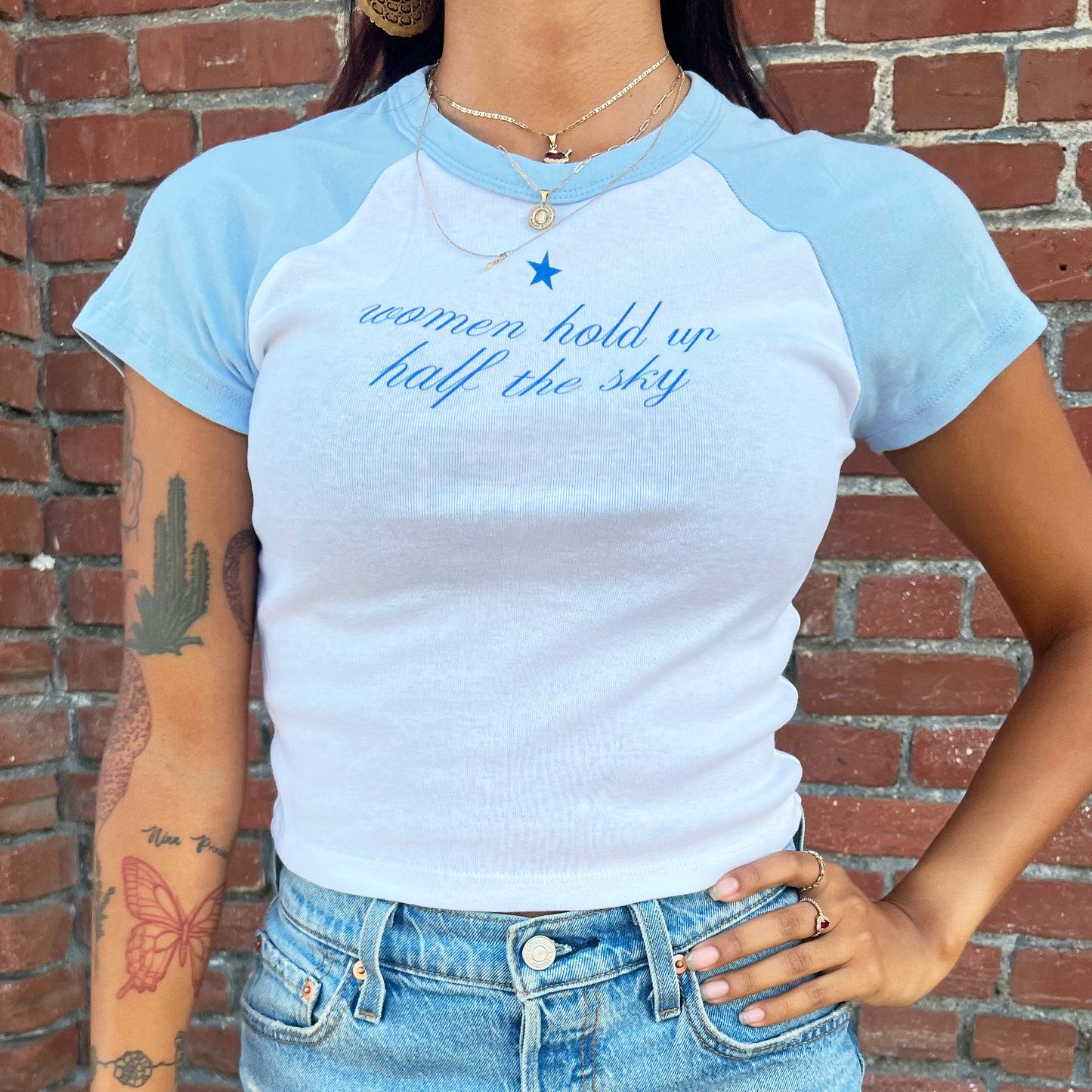 Women Hold Up Half the Sky | Baby Tee